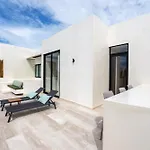 Sleek Penthouse Escape With Rooftop Pool
