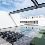 Sleek Penthouse Escape With Rooftop Pool